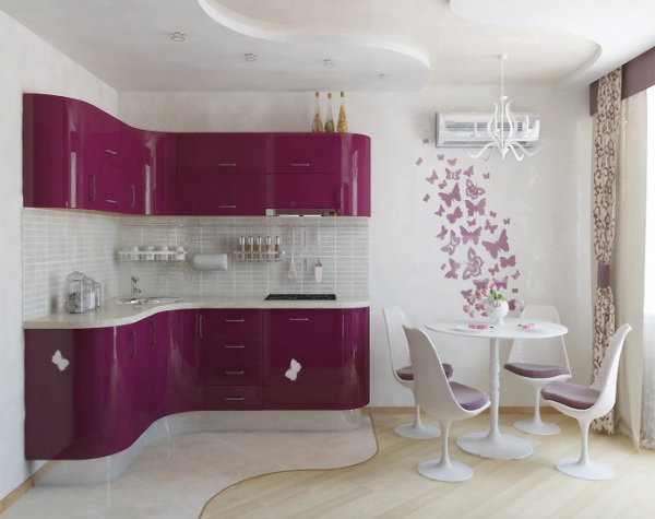 25. PINK KITCHEN WITH A SMALL ROUNDED EAT-IN TABLE