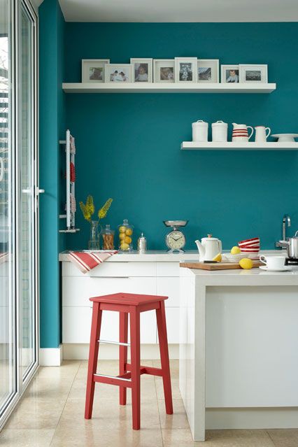 10. White Cabinets, Teal Walls