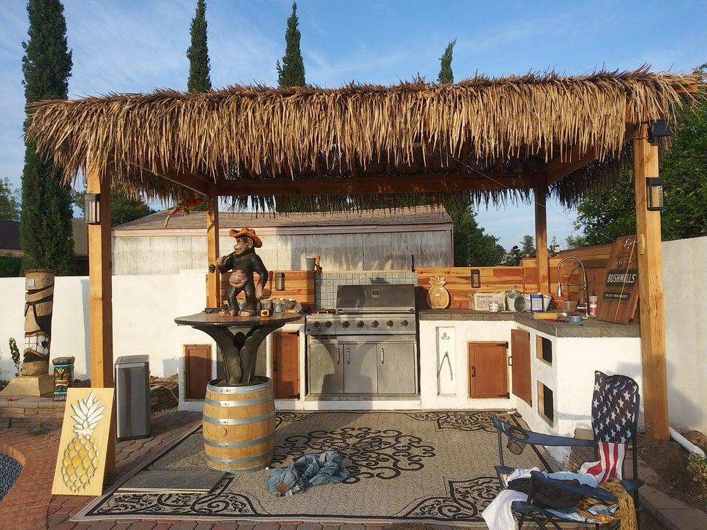 14. DIY Palapa Tiki Hut With Outdoor Kitchen