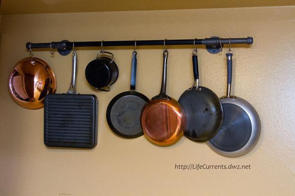 2. DIY Pot Rack With Pipes