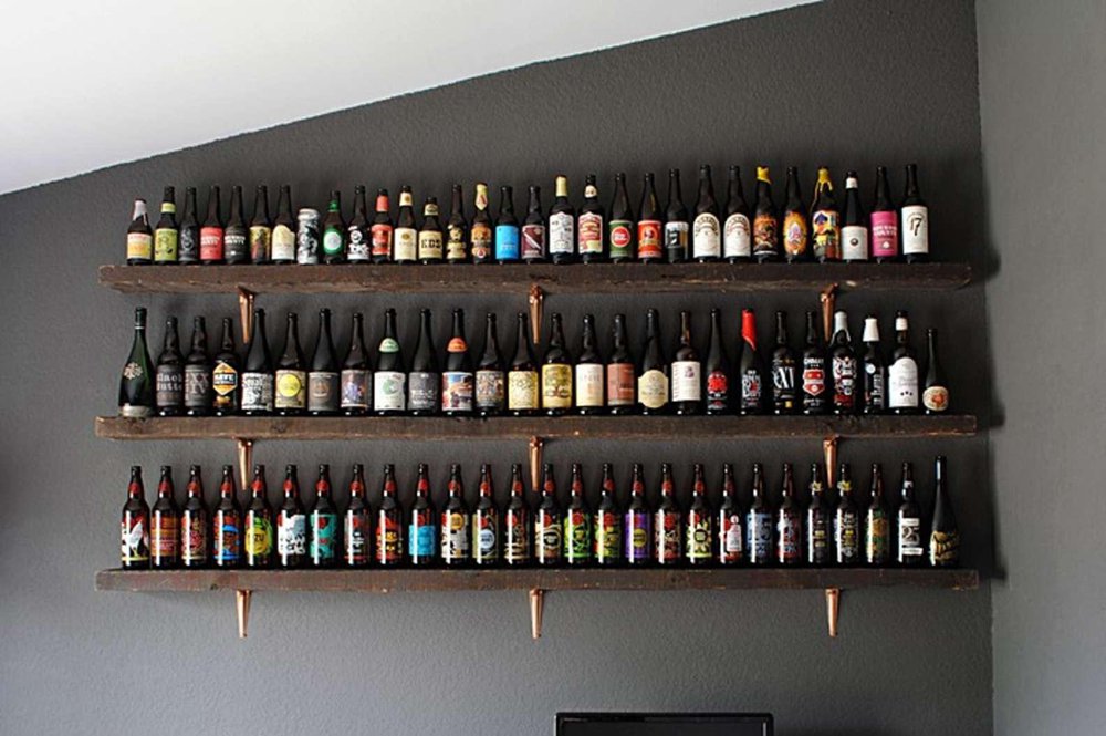 24. DIY Rustic Wine Shelves