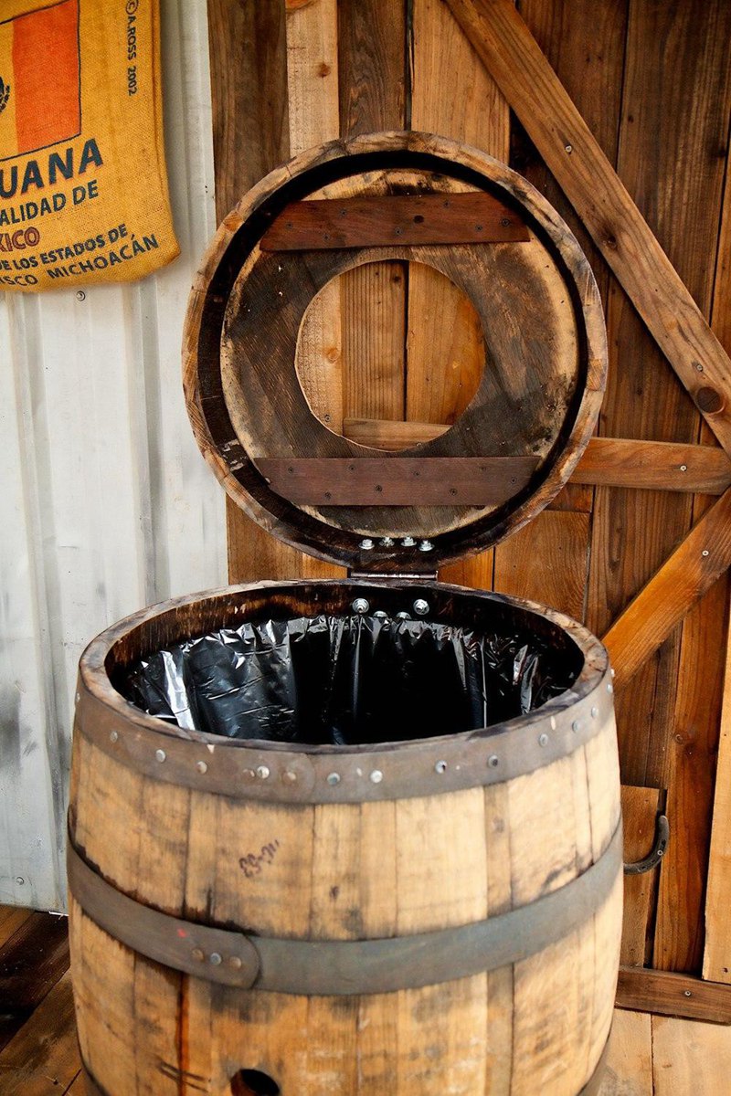 26. Barrel Trash Can Storage