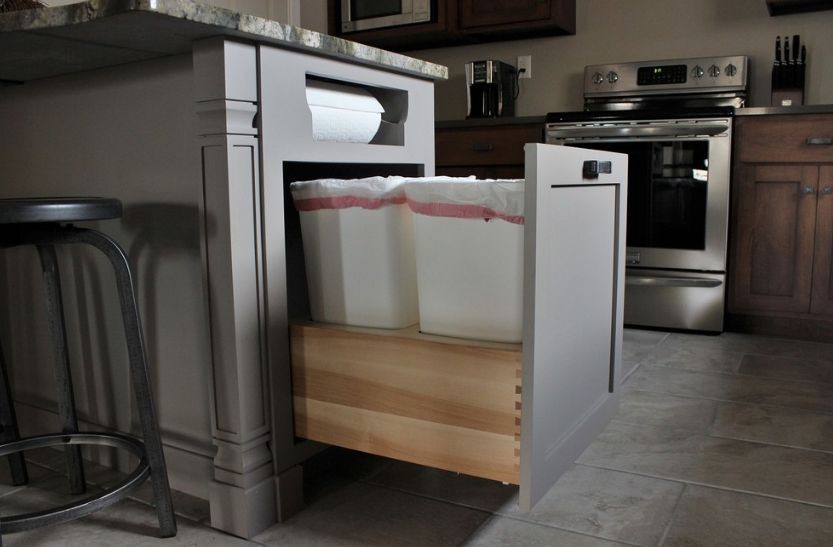 9. Kitchen Island Trash Can Storage