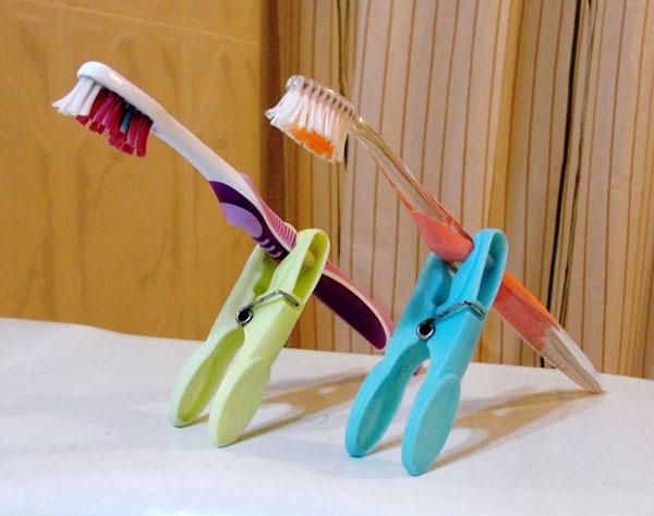 12. Clothespin Toothbrush Holder DIY