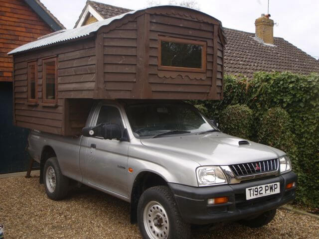 7. A homemade truck camper that is a work of art