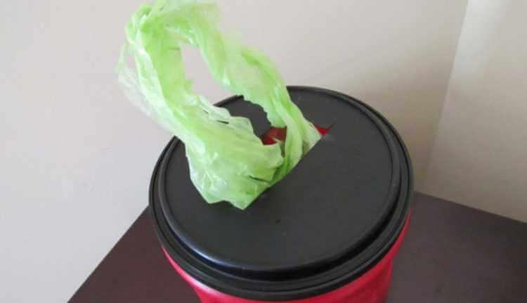 21. DIY Coffee Can Plastic Bag Holder