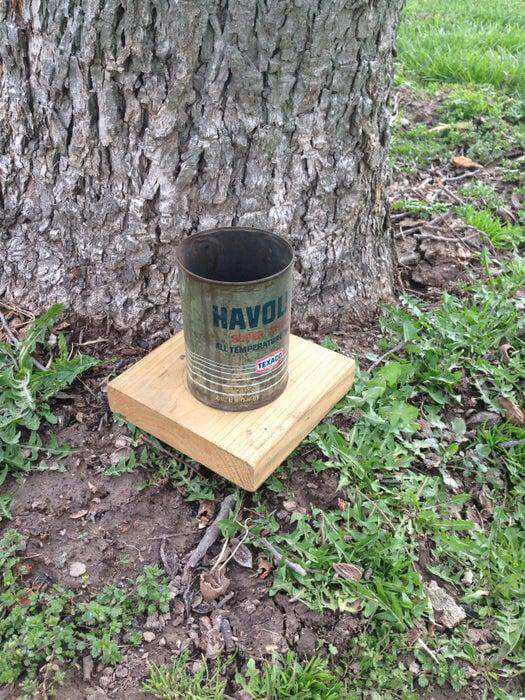 22. DIY Oil Can Squirrel Feeder