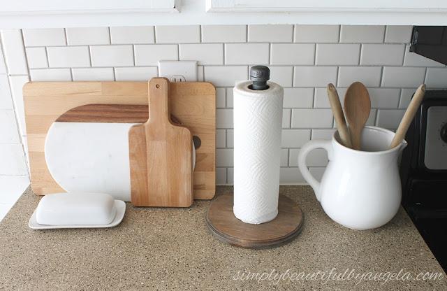 20. DIY Industrial Pipe Paper Towel Holder