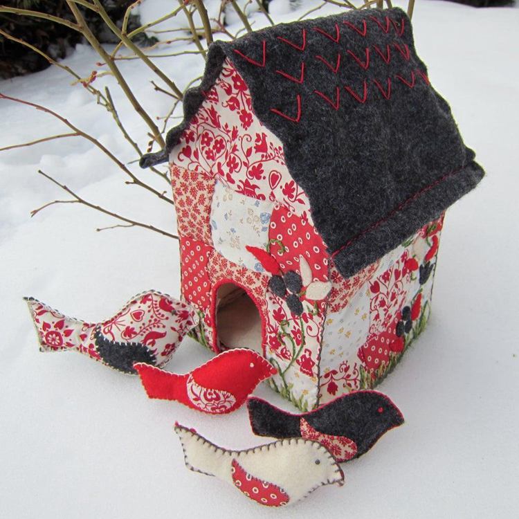 14. Quilted Bird House With Toy Bird Rattles