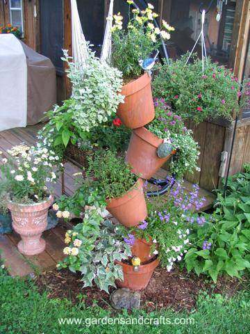 2. Tipsy Pots Tower Planter