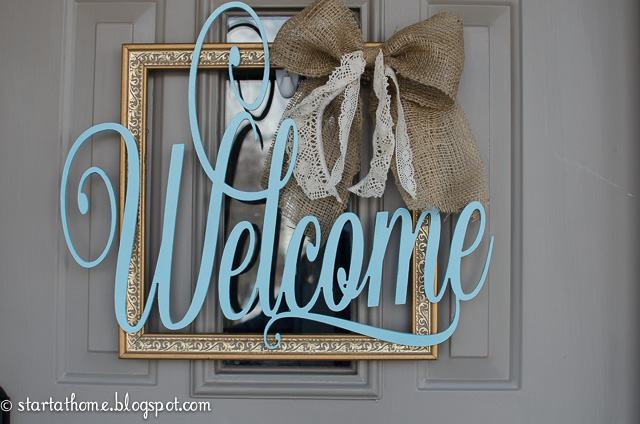 23. DIY Welcome Door Hanger