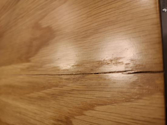 Crack marks on the finish as well as the wood