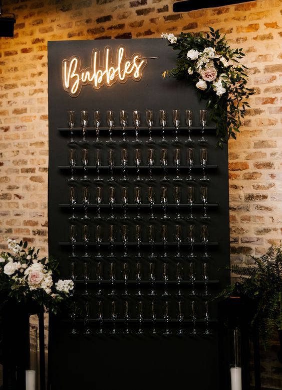 22. Creative Champagne Wall With Neon Lighting