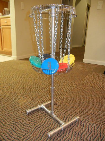 11. Portable Mini Disc Golf Basket