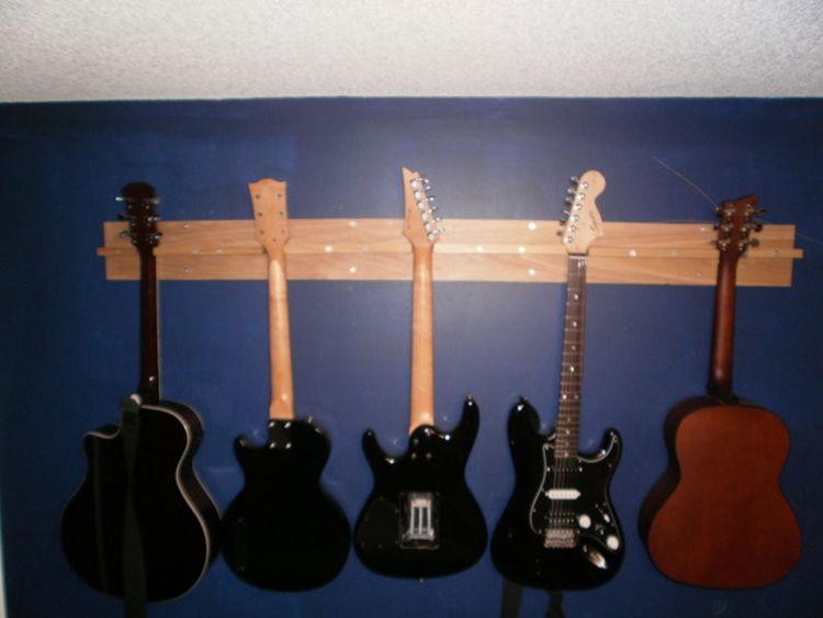 8. Five Guitar Wall Hanger