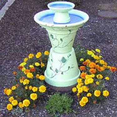 2. The Barnyard Terra Cotta Bird Bath