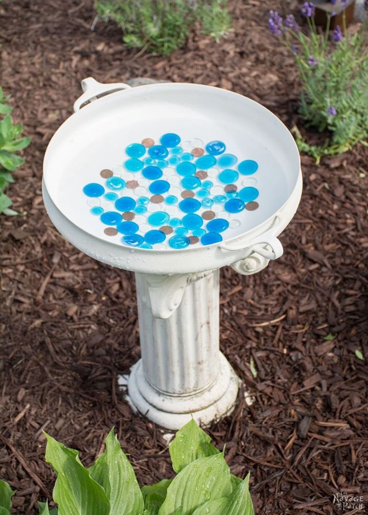 41. Upcycled Metal Dish on a Column